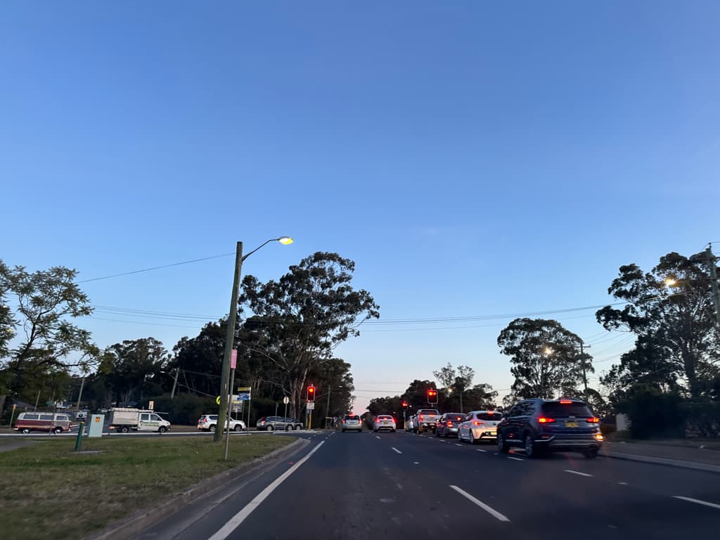 A wide suburban road in the Penrith area of Western Sydney under an open sky